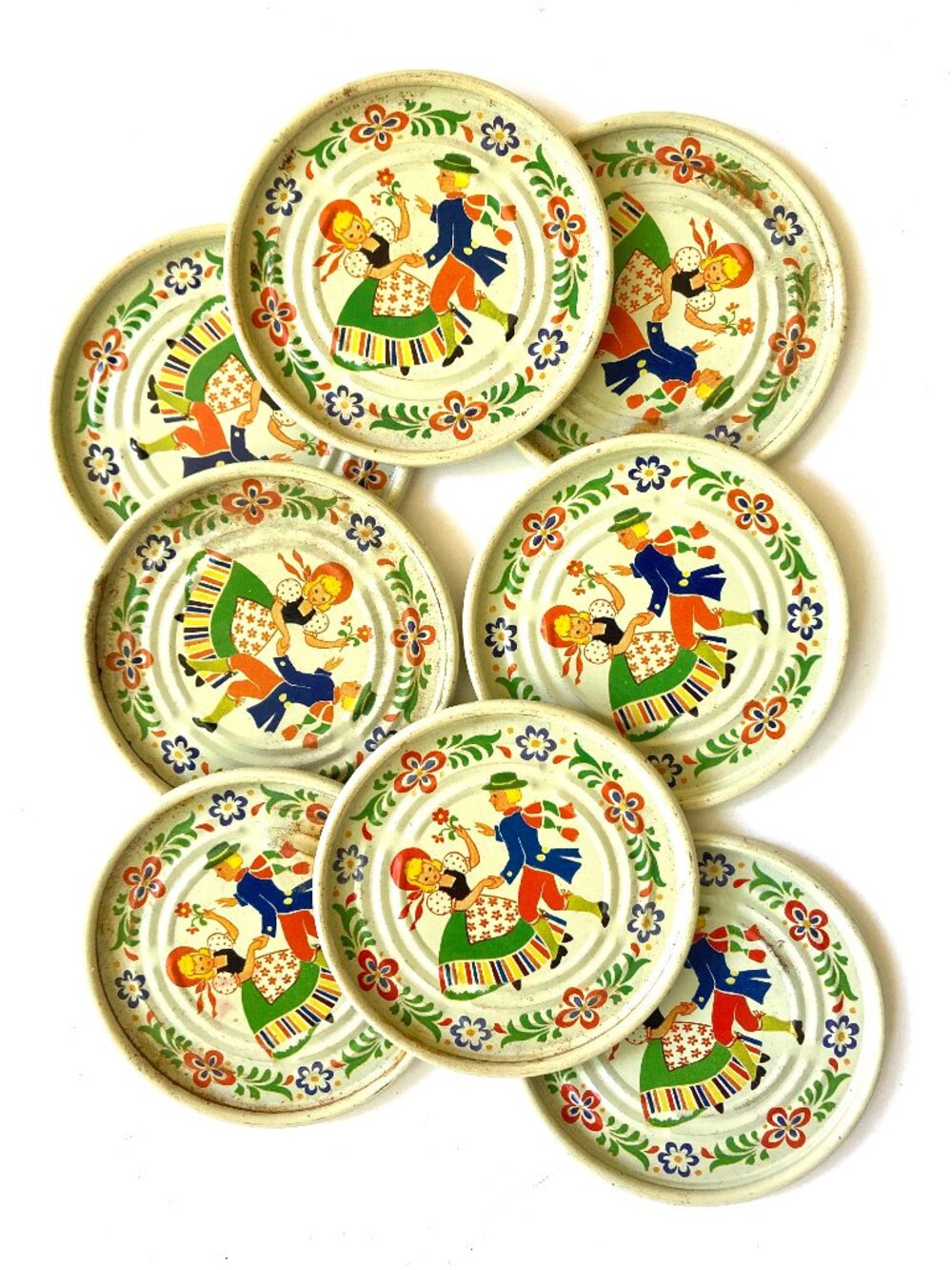 Set of 8 small Vintage European Tin Coasters